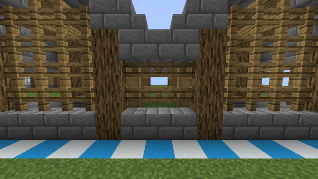 Adding a double-layer of fence gates to the horse stable.