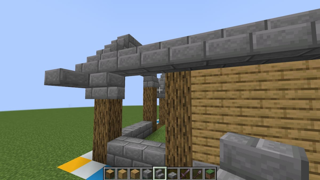 Step 17 of the Minecraft horse stable's roof.