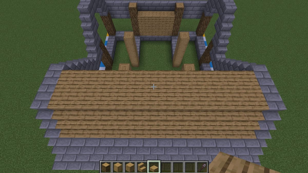 Step 24 of the Minecraft horse stable's roof.