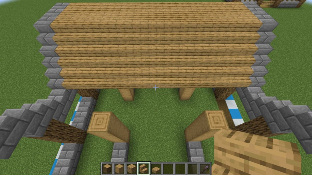 Step 26 of the Minecraft horse stable's roof.