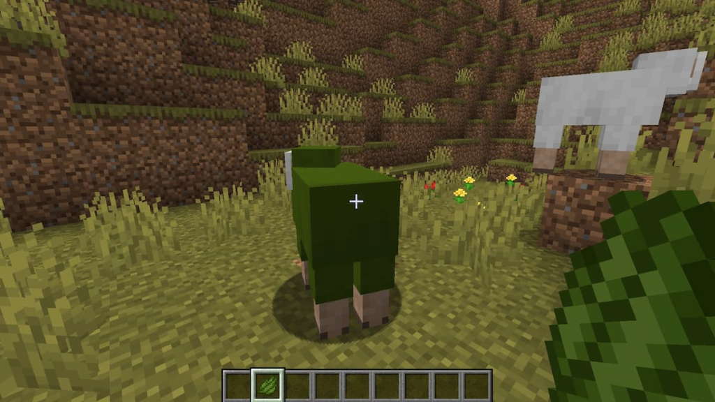 Using green dye to turn a sheep green.